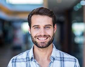 A happy and smiling young man